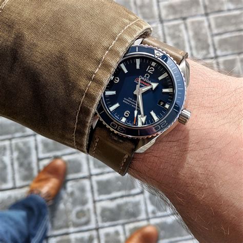 used omega planet ocean 42mm.